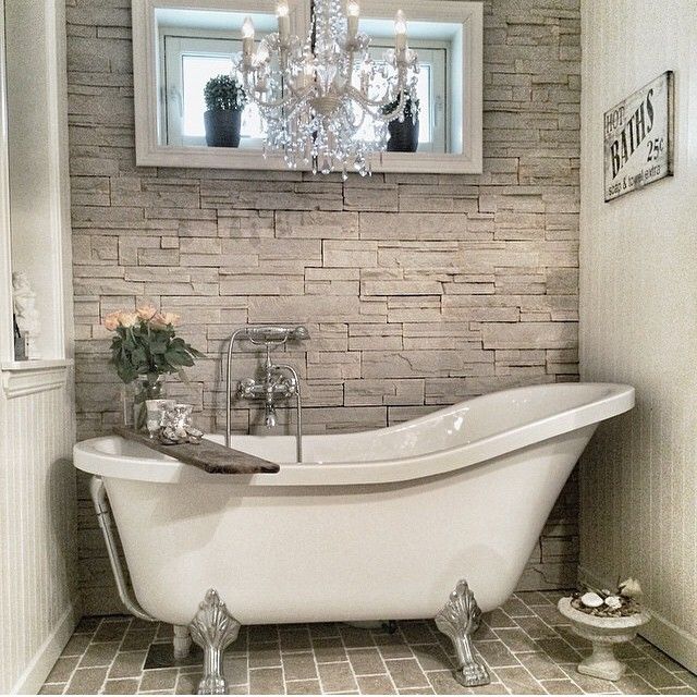 This pretty bath might look squeezed in but still looks inviting .