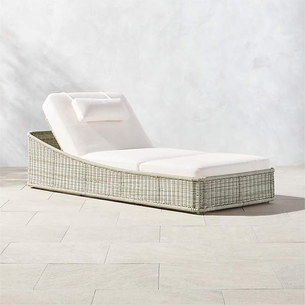 Nino Modern White Rattan Outdoor Chaise Lounge with White Boucle .