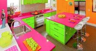 Eclectic Neon Pink and Green Kitchen with Diner-Style Stools .