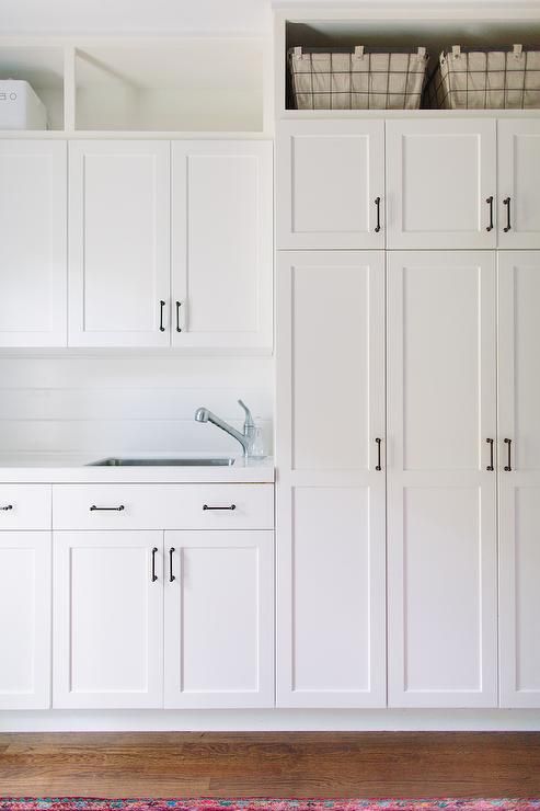 White Laundry Cabinets with Shiplap Backsplash - Transitional .