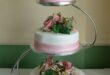 something to go with the metal ring toppers? 3-tiered wedding cake .