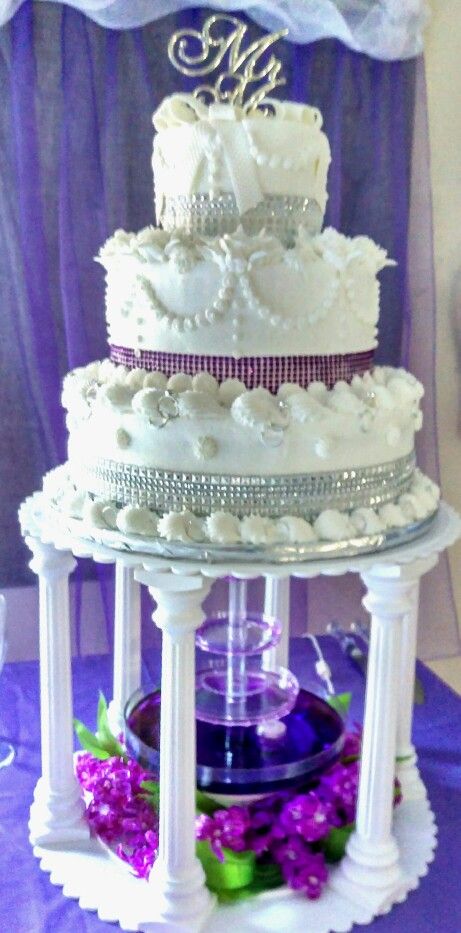 3 tier wedding cake in purple with lighted fountain | Fountain .