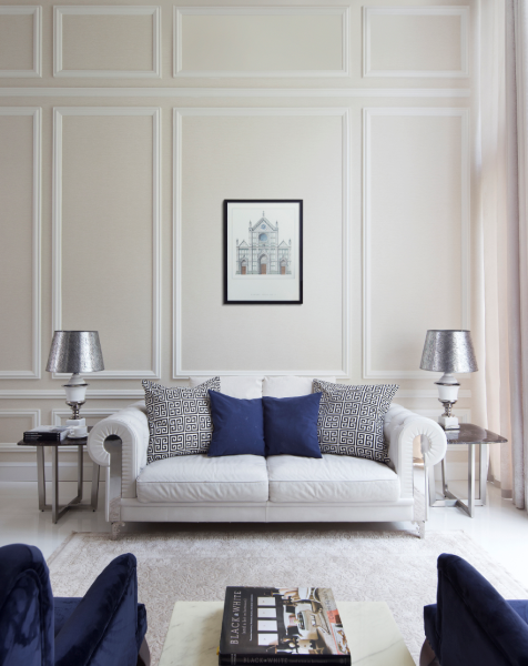 The elegant colour choice, wainscoted walls and classical-style .