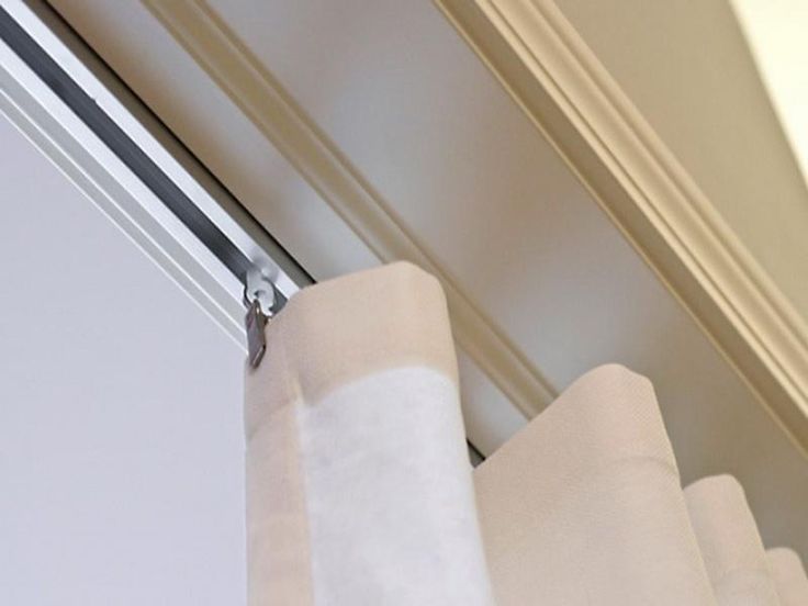 Ceiling Curtain Track with decorative trim in front. Place rod as .