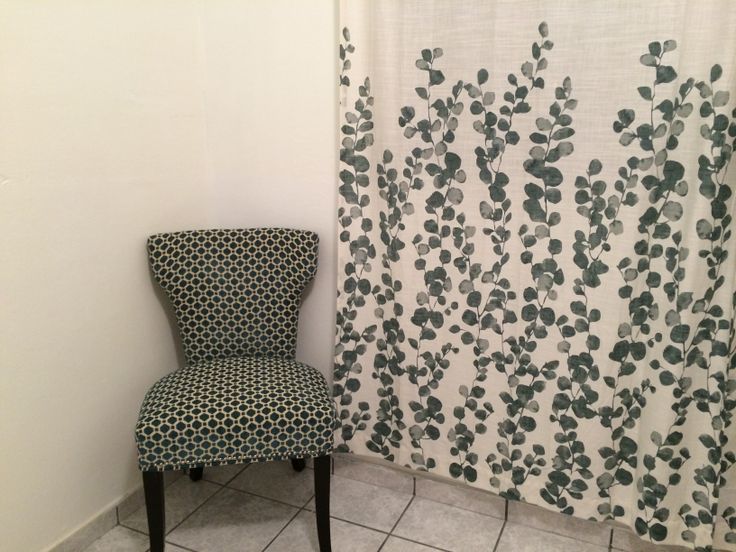 Cynthia Rowley accent chair and Tahari Home curtains. | Tahari .
