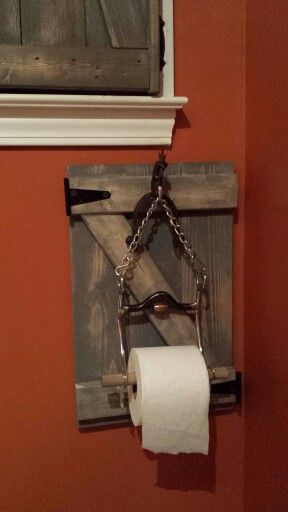Toilet Paper holder made from horse bit | Rustic bathroom designs .