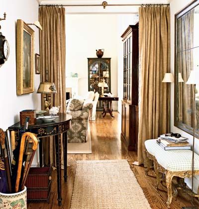 Love the look of burlap curtains framing a hallway/door leading to .
