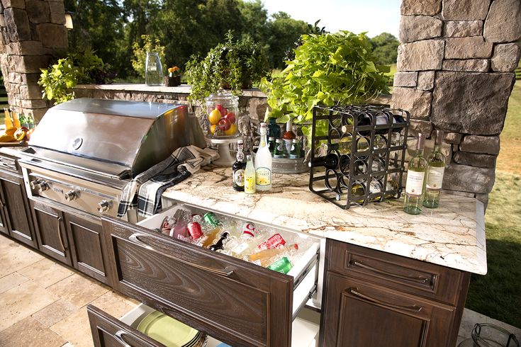 Trex Outdoor Kitchens features customizable cabinets that provide .