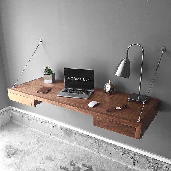 12 floating desks that look great and take up minimal space .