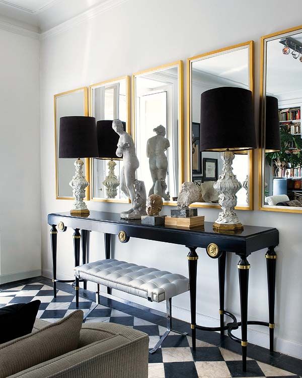 multiple mirrors. raul martins. | Gold living room, Black and gold .