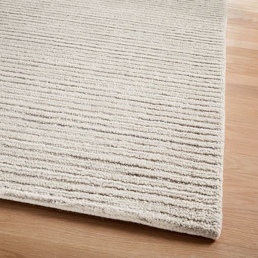 Lumini Easy Care Rug | Easy care rug, Solid color rug, Solid ru