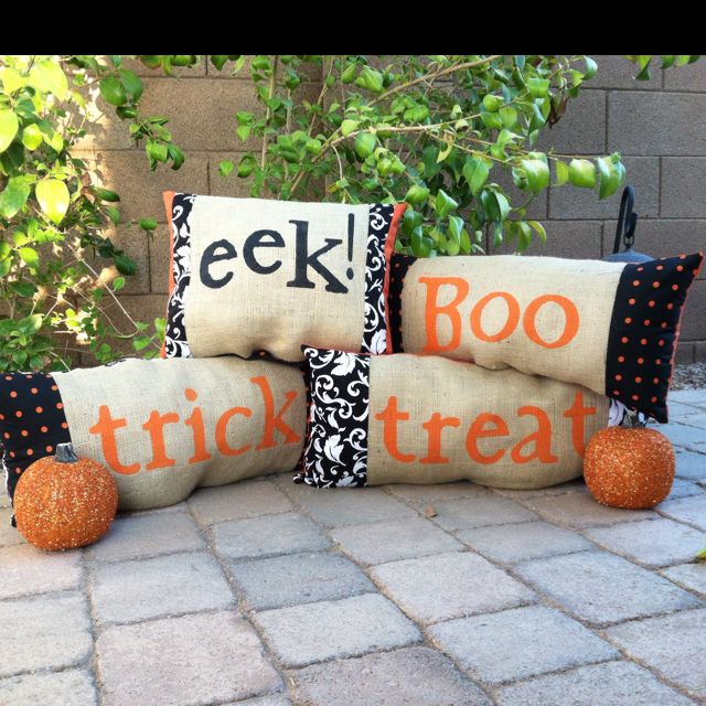 Burlap Halloween pillows with fabric borders.I think these would .