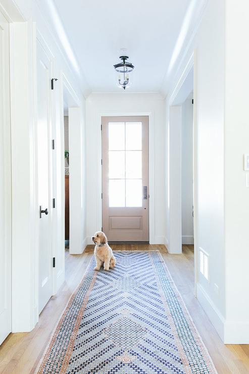 Long Foyer Hallway with Pink and Blue Runner - Transitional .