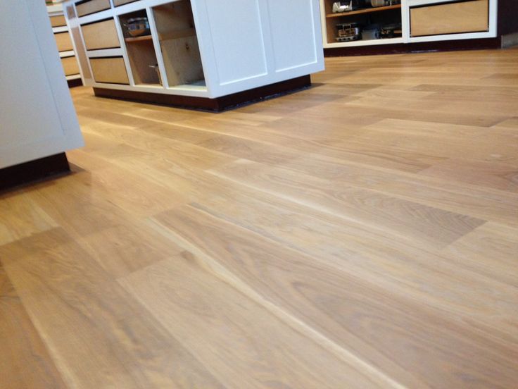 JOB WE INSTALLED: American white oak solid 7" wide with Woca white .