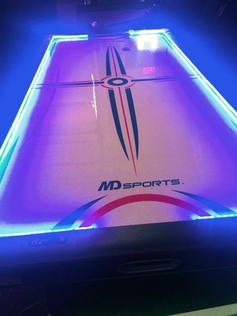 Glow in the dark air hockey tables. Neon light air hockey table .