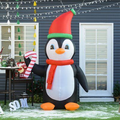 The Holiday Aisle® Penguin Holding Candy Cane Christmas Inflatable .