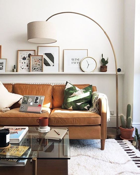 Modern Looks for Art Ledges | Mid century modern living room .
