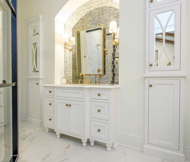 Bathroom Cabinet tucked into an arched niche and two cabinet .