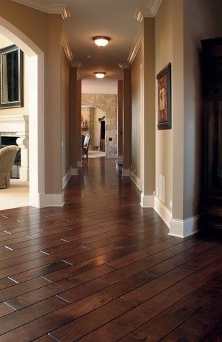 Black Walnut hardwood floor, smooth face, hand beveled,stained in .
