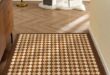 Rectangular Faux Leather Checkerboard Rug from Apollo Box .
