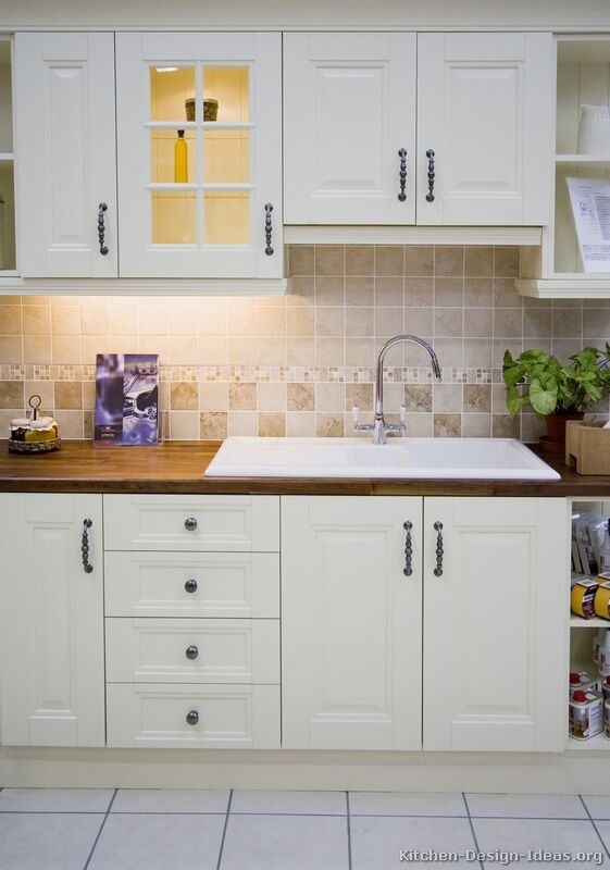 Love the butcherblock with the white sink! | Small kitchen cabinet .
