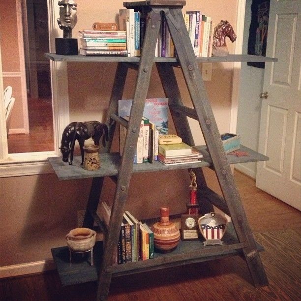 A simple DIY bookcase can be made with a ladder and some wood .