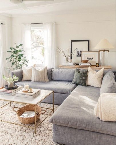 modern farmhouse living room with gray sectional sofa and .