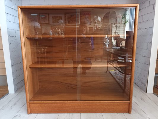 Mid-Century Bookcase in Teak with Sliding Glass Doors for sale at .