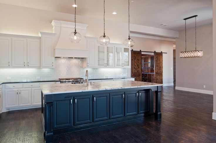 Designed by Cleve Adamson Custom Homes. Gorgeous custom kitchen .