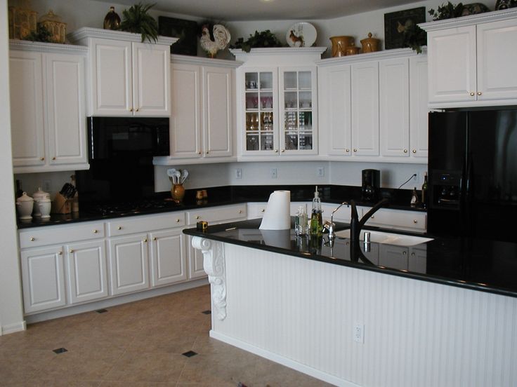 creamy white kitchen cabinets with black appliances | Are white ca .
