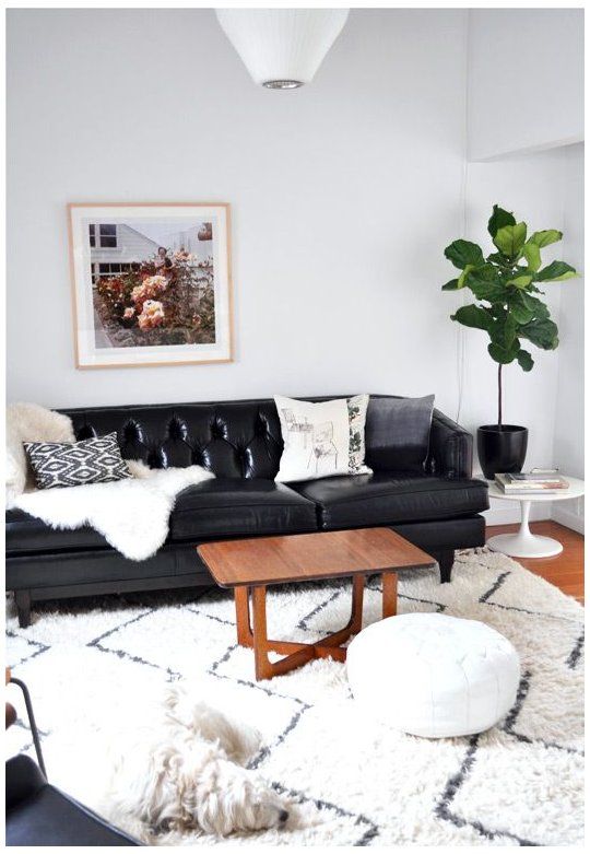 modern cottage. #black #sofa #chair so, we're all finally back .