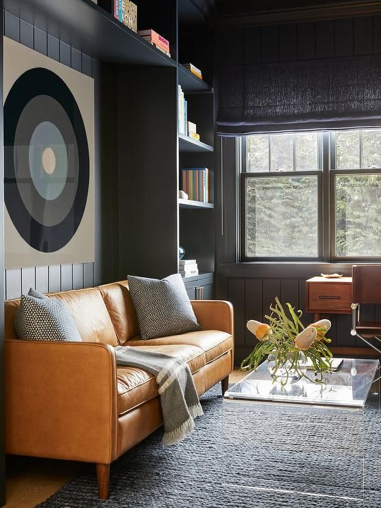 Orange Leather Sofa with Black Built In Cabinets - Transitional .