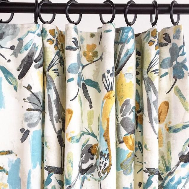 A watery, painted bird fabric in fresh colours of turquoise, aqua .