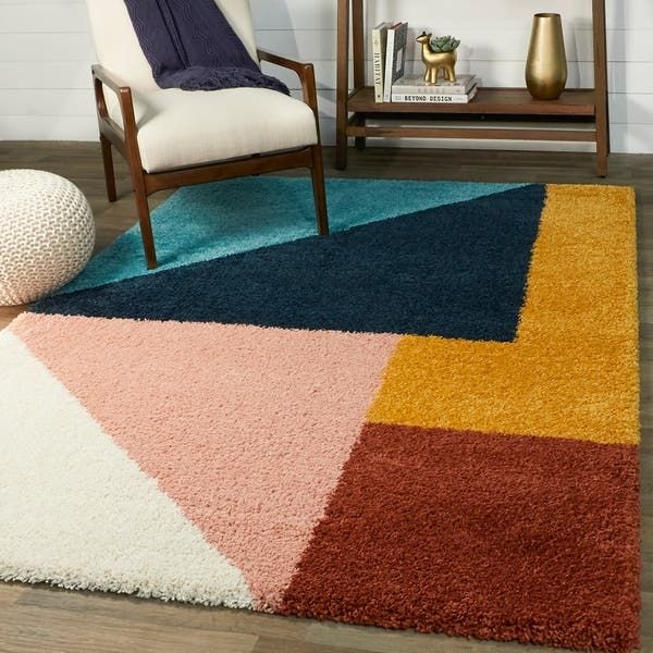 Turquoise rug- a vibrant color for room décor
