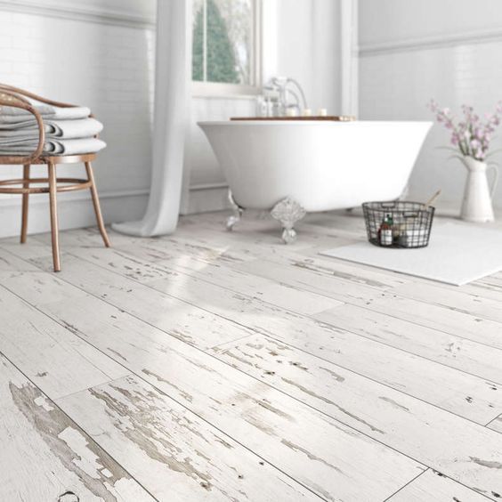 10 waterproof vinyl flooring with a whitewashed shabby chic look .
