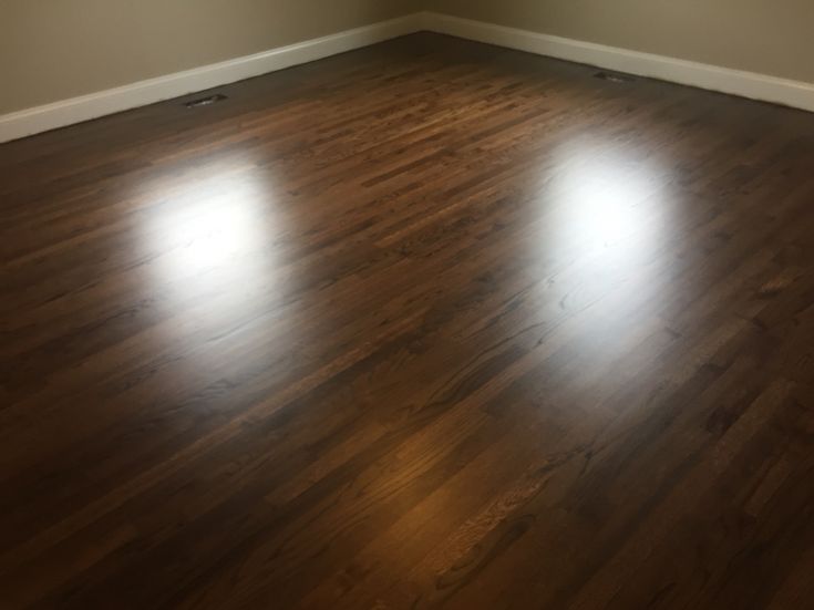 Refinished oak flooring with Duraseal dark walnut stain and 3coqts .