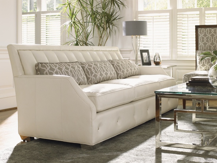 I'm not much of a formal living room gal, but I adore this sofa .