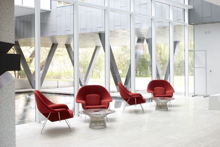 Saarinen Womb Chairs are the perfect complement to any workspace .