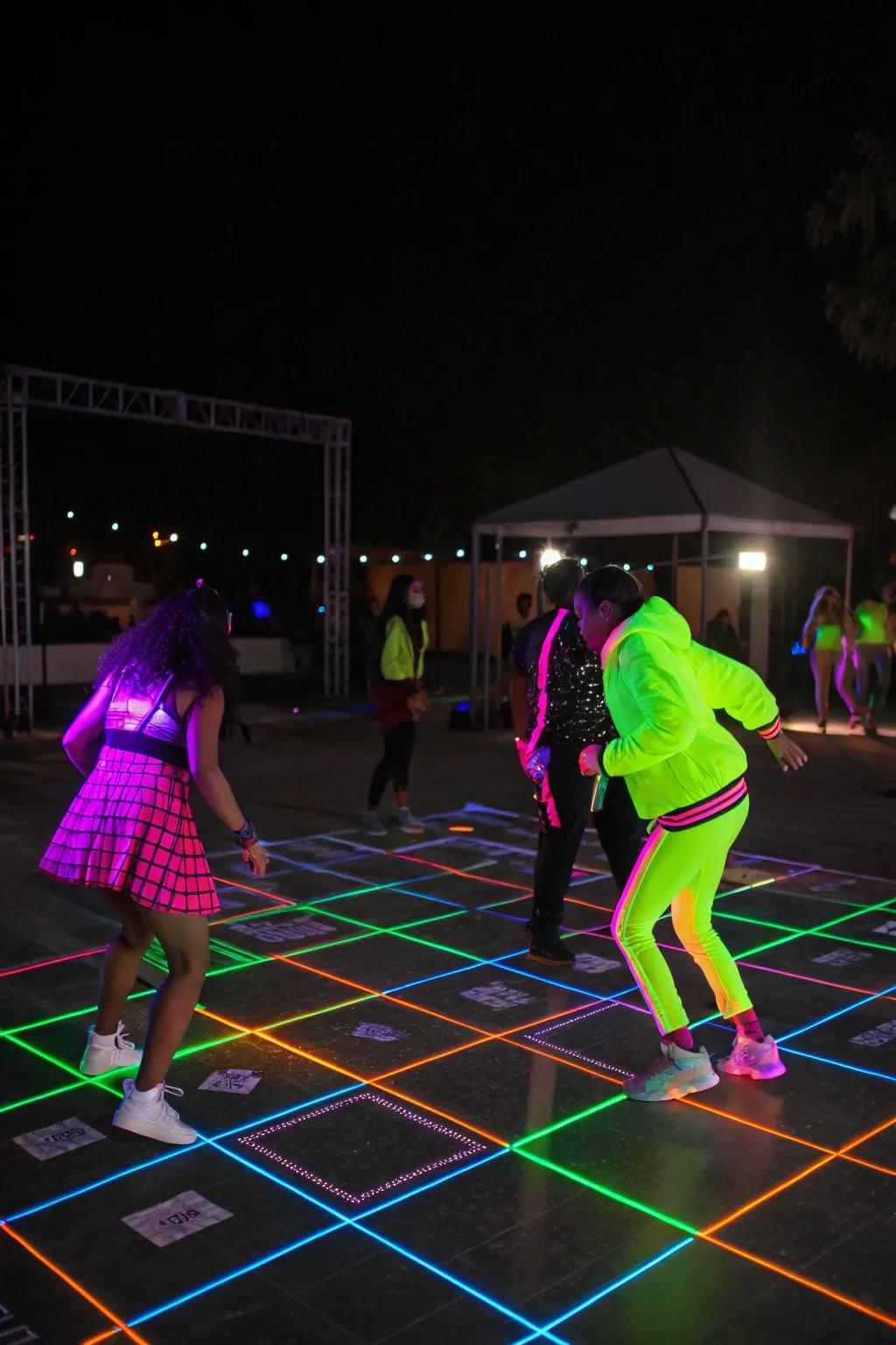 A black light dance floor where every move glows!