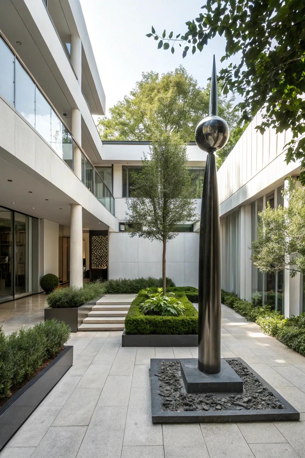 Sculptural elements add a touch of art to a modern courtyard.