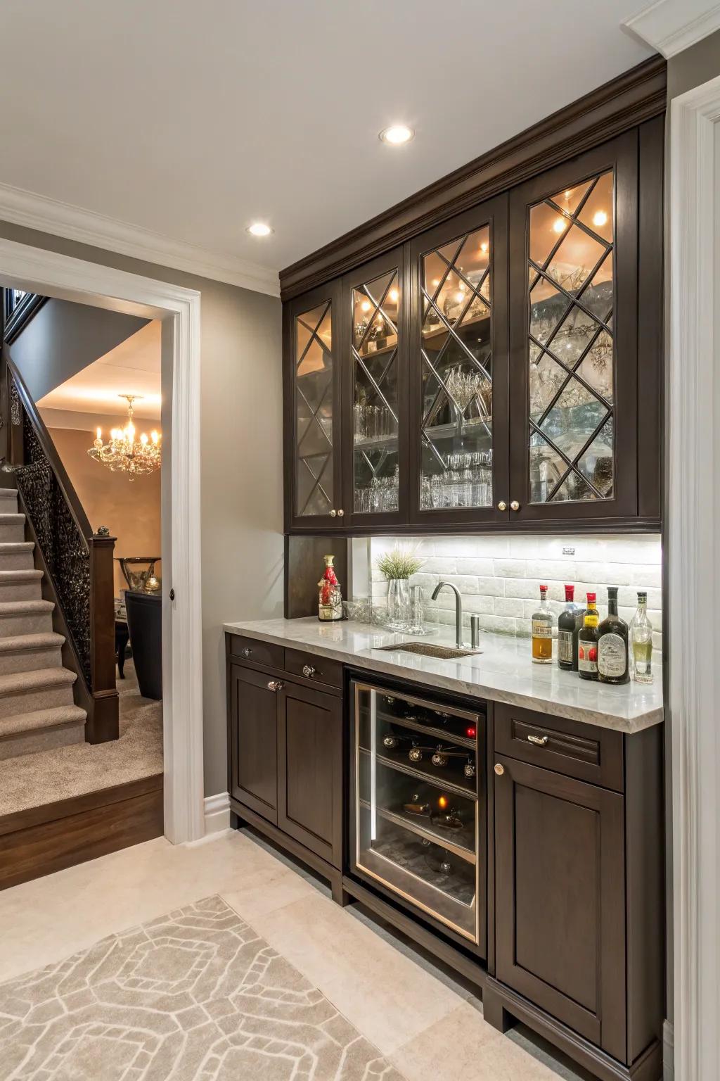 A mirrored backsplash adds depth and glamour to a narrow bar space.