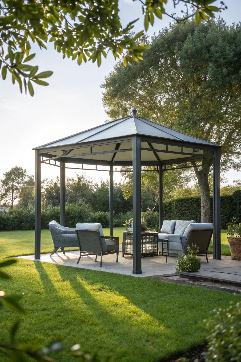 A sleek metal pavilion-style gazebo with contemporary furnishings.
