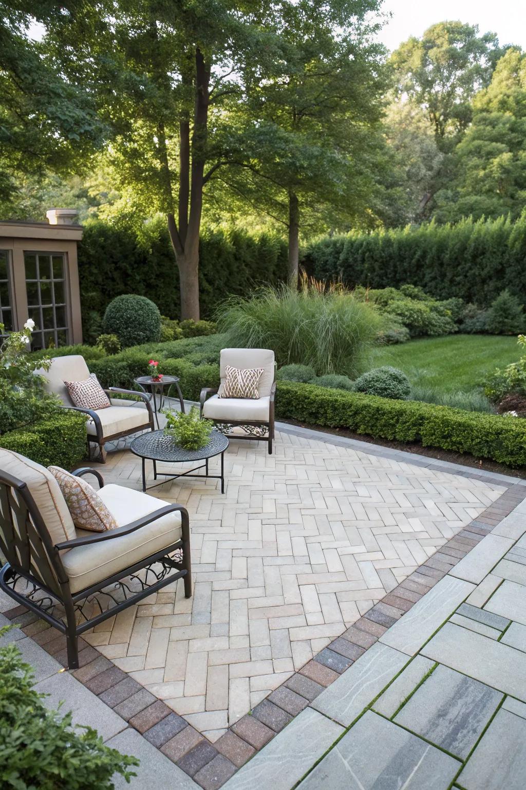 A classic herringbone paver design that adds elegance to the patio.