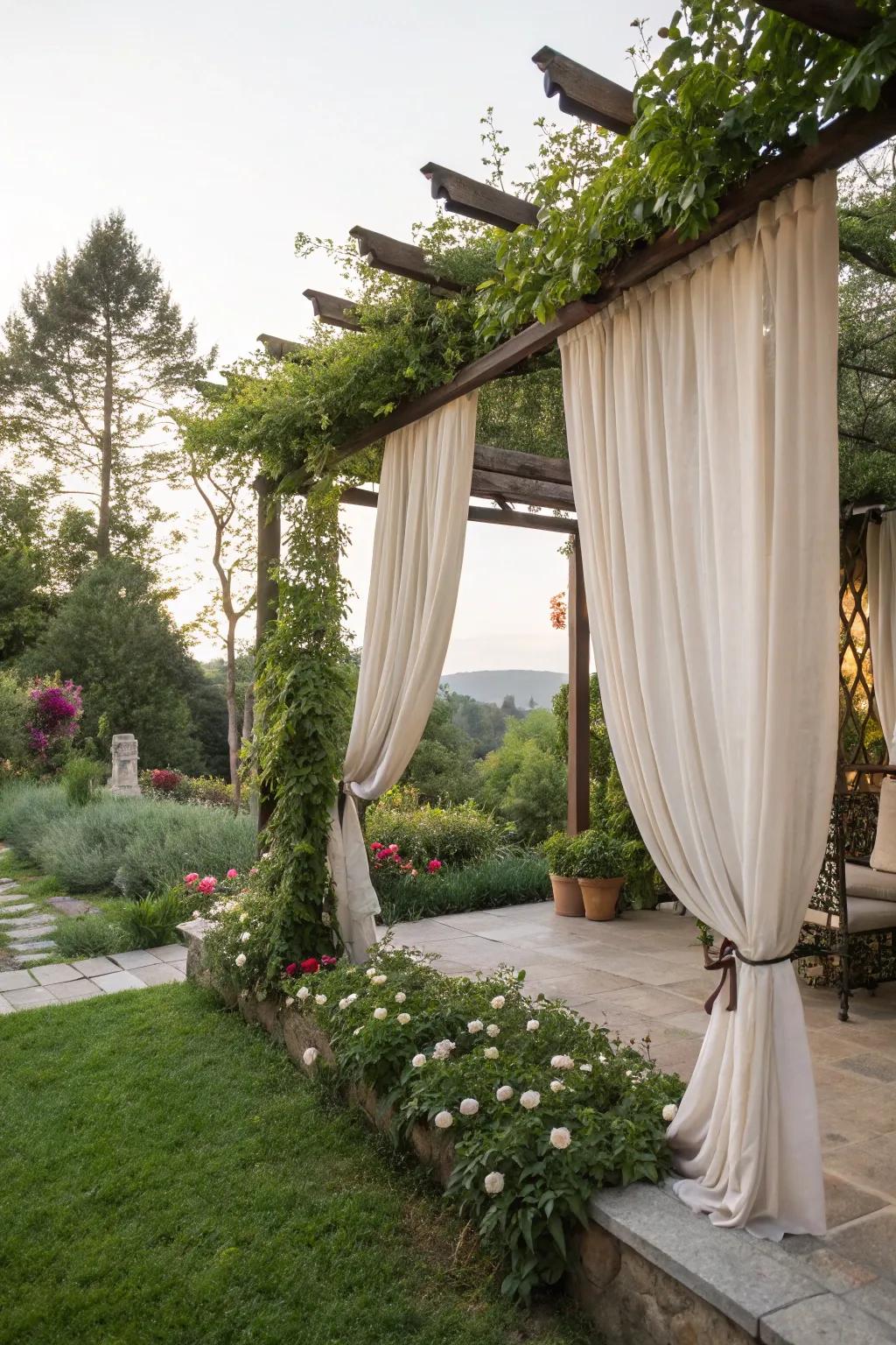 Outdoor curtains add a touch of elegance and privacy to a pergola.