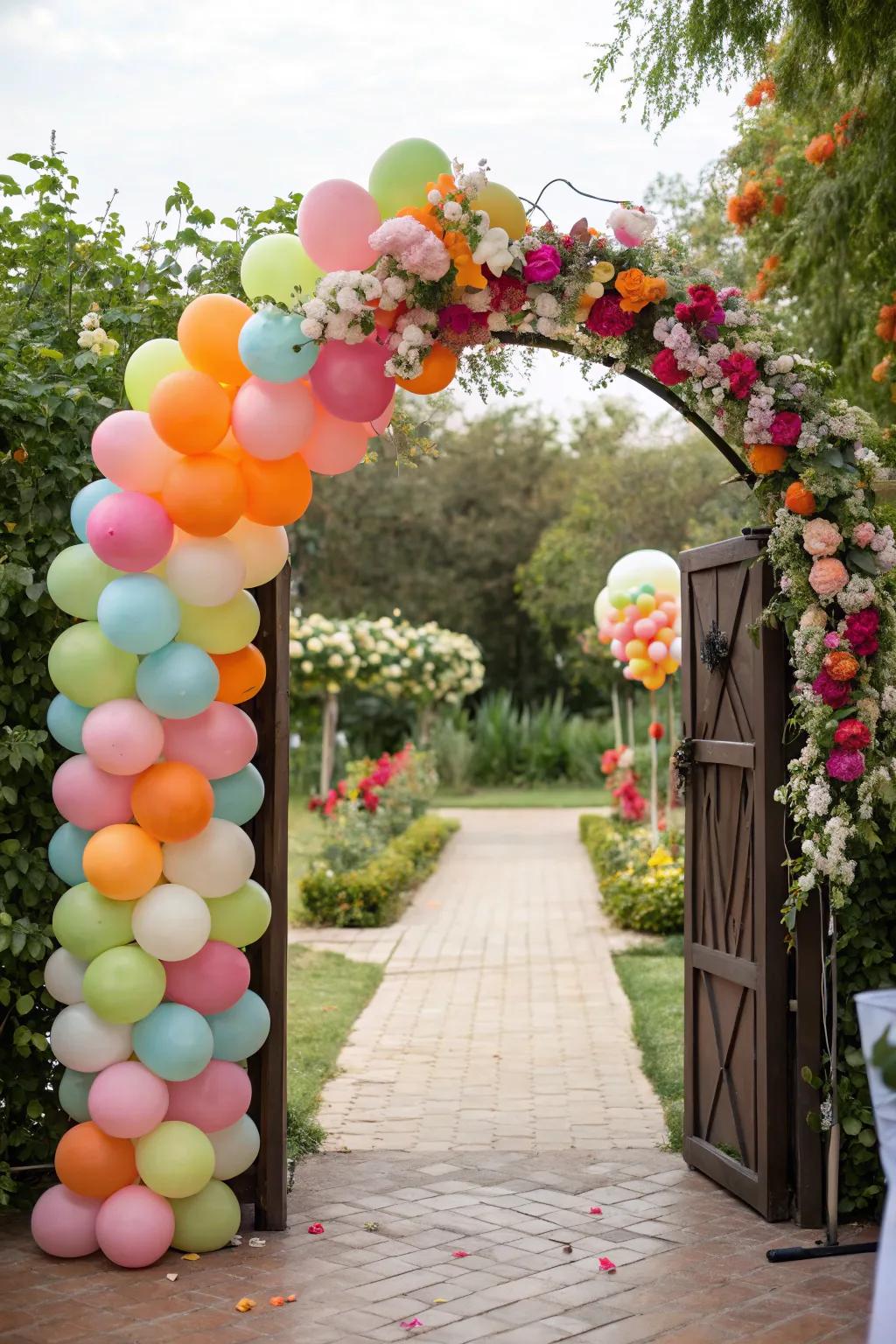 A grand balloon archway welcoming guests to the enchanted garden.