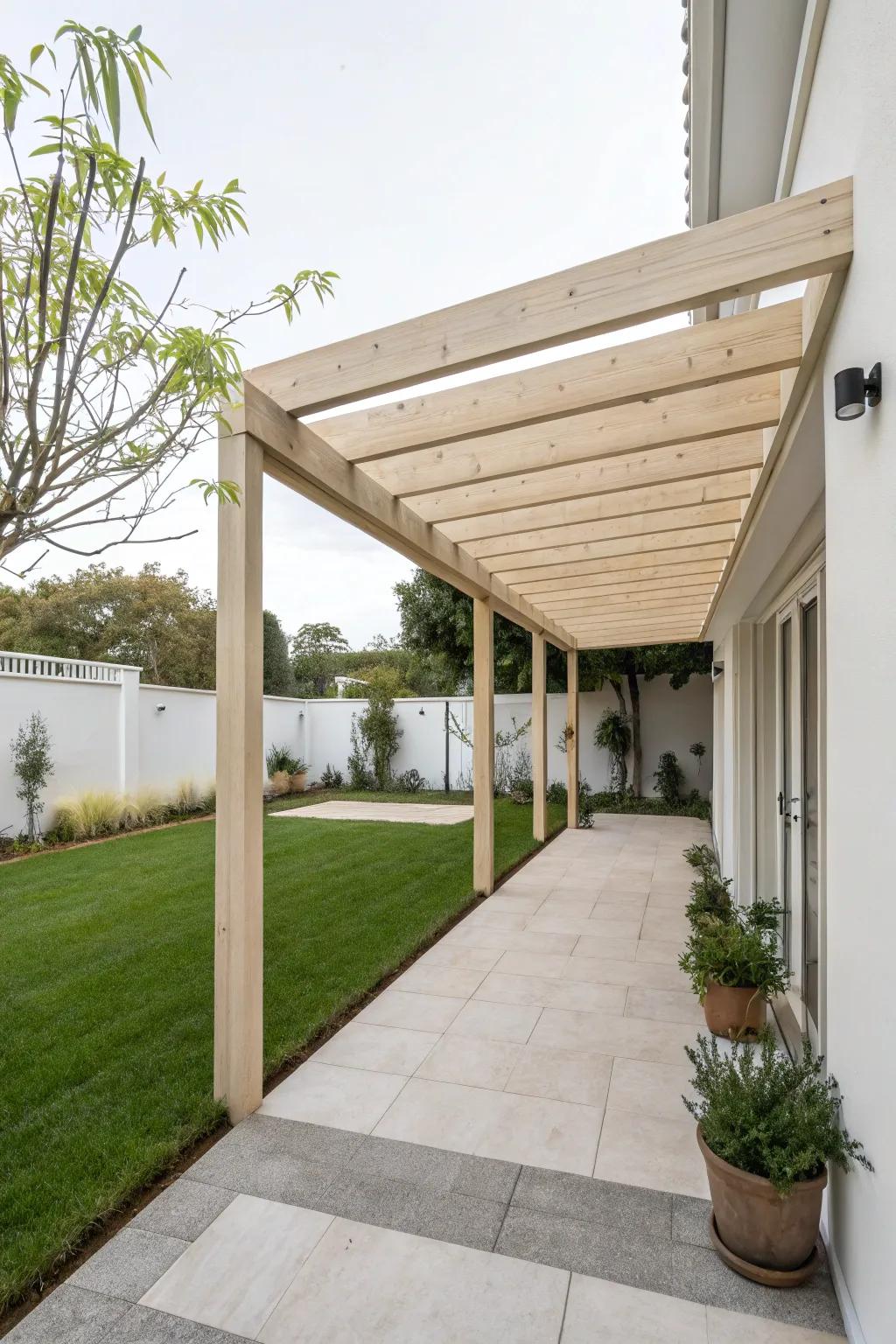 A minimalist pergola adds modern elegance to a side yard.