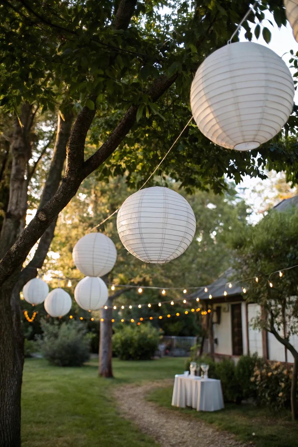 White paper lanterns add a whimsical charm to outdoor spaces.