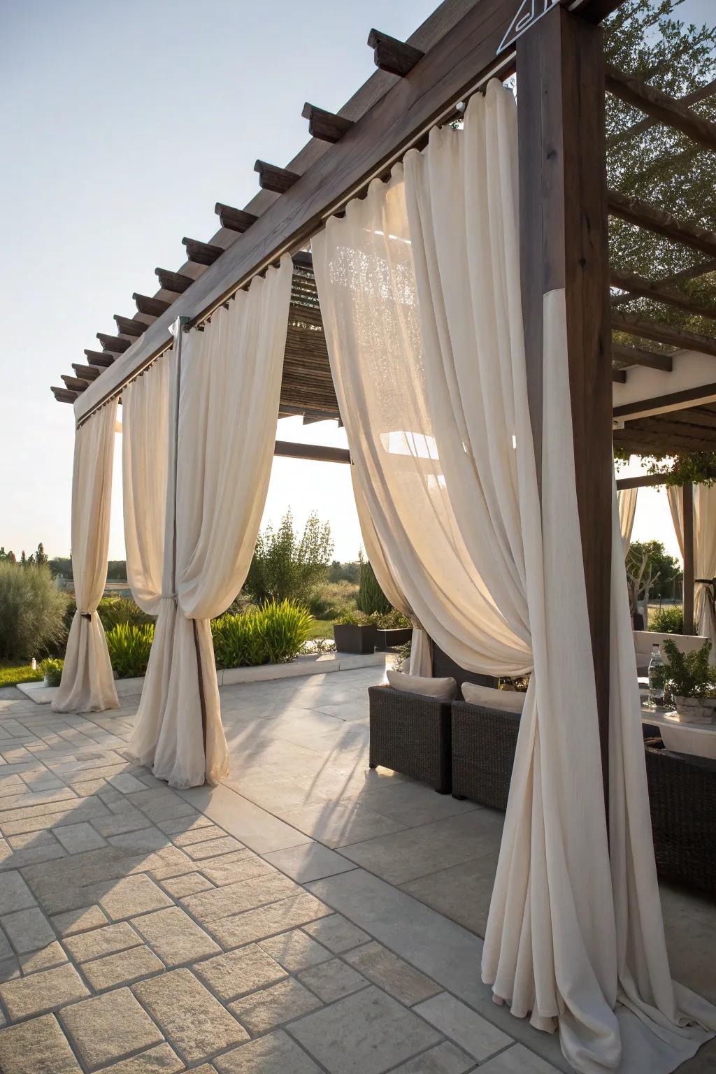 Outdoor curtains add elegance and wind protection.