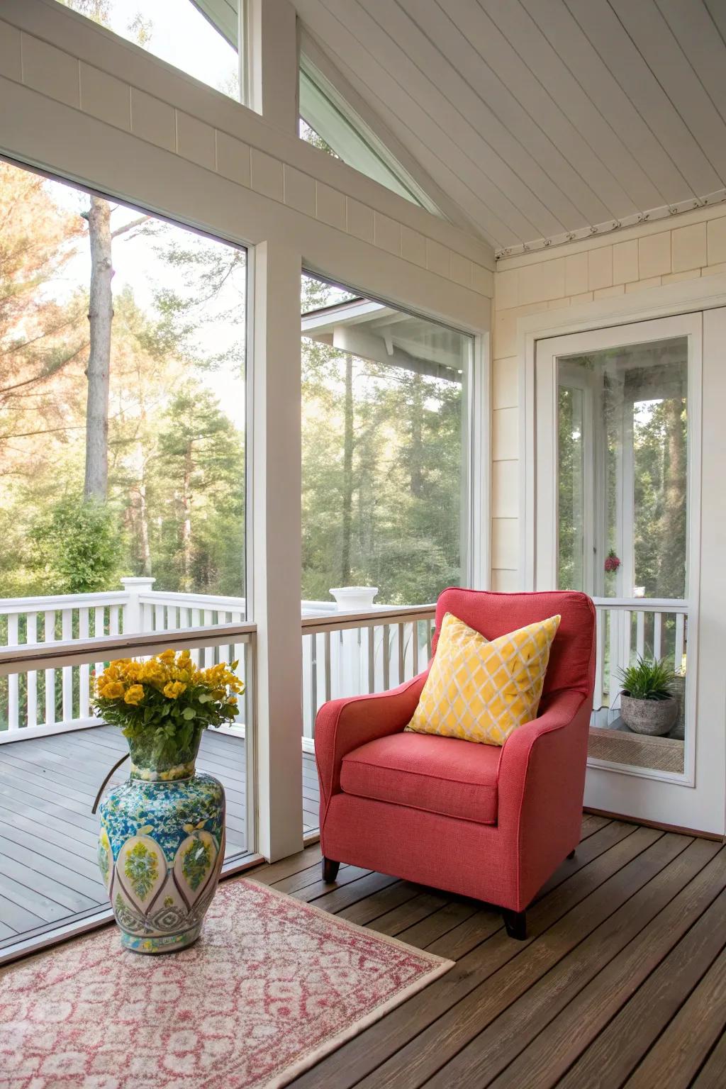 A vibrant armchair and vase add a refreshing pop of color to this porch.