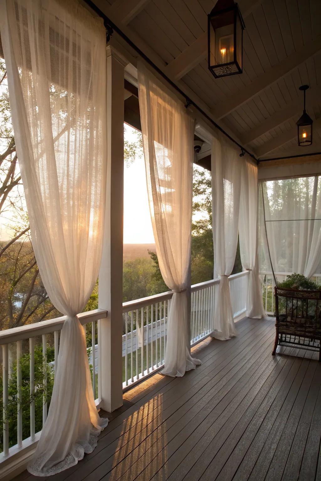 Elegant sheer curtains add privacy and a touch of romance to this porch.